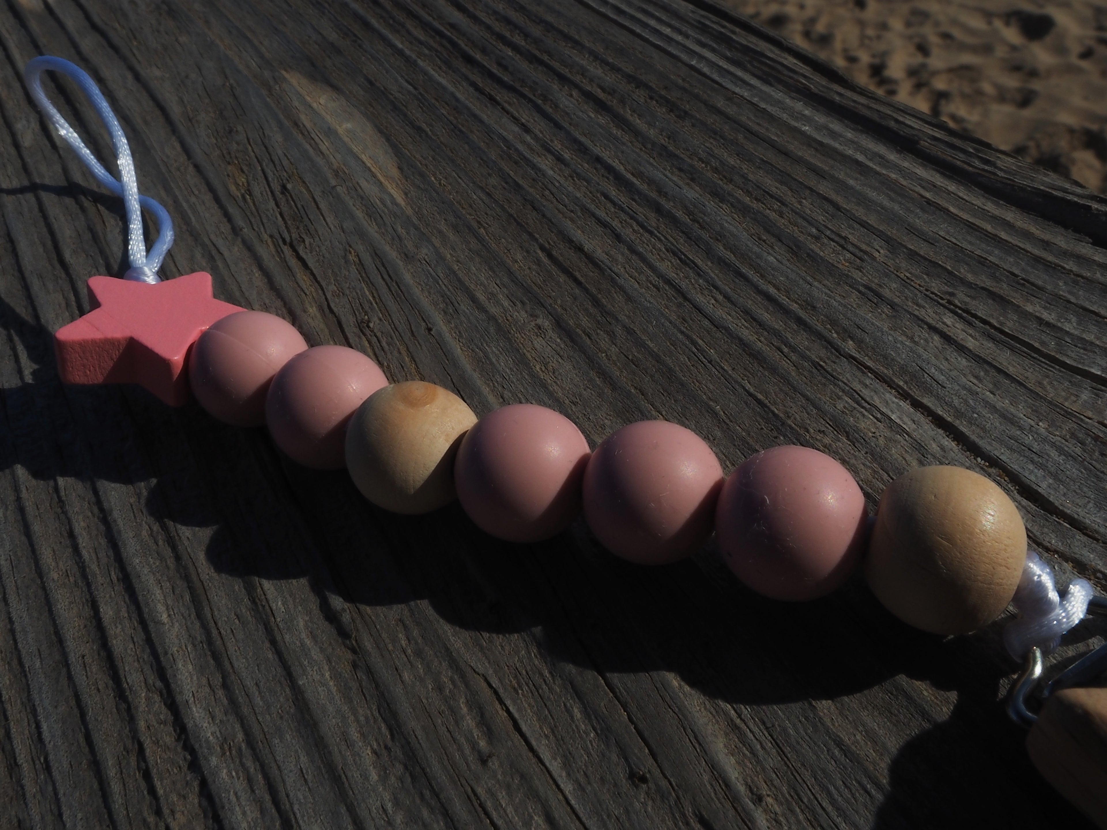 Chupetero estrella rosa